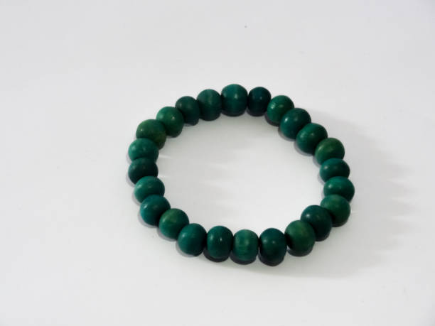 istock bracelet in green on white background 1280828101