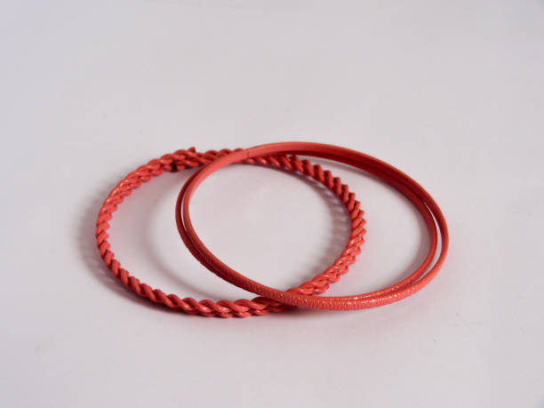 istock bracelet in pink metal on white background 1280828775