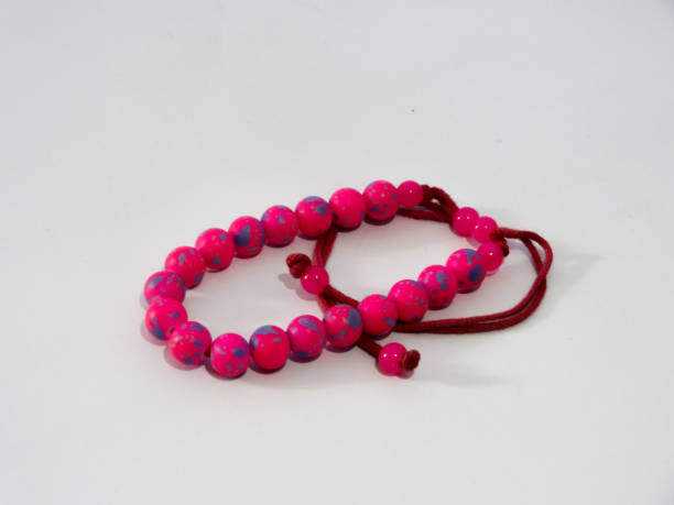 istock bracelet in purple on white background 1280828872