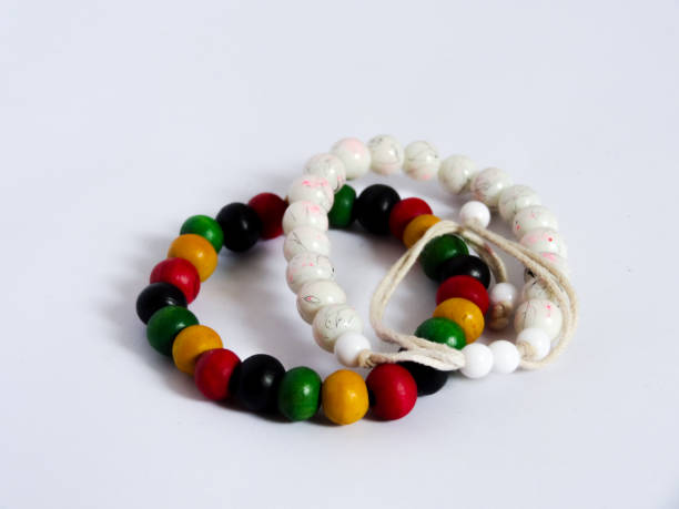 istock bracelet in colorful and white on white background 1280829545
