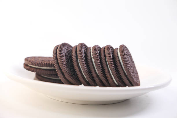 istock homemade chocolate biscuits on plate isolated on white 1280830247