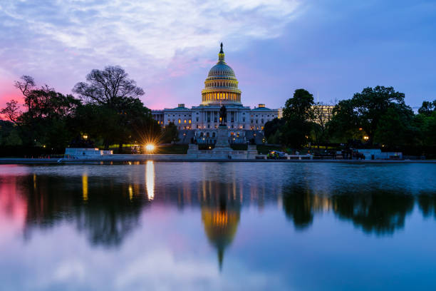 Capitol building with reflections at sunrise, Washington DC, USA Capitol building with reflections at sunrise, Washington DC, USA house of representatives photos stock pictures, royalty-free photos & images