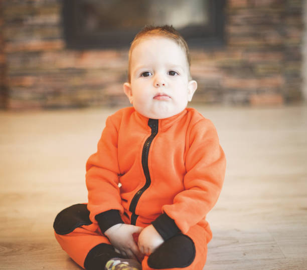 istock toddler boy playing at home 1280843808