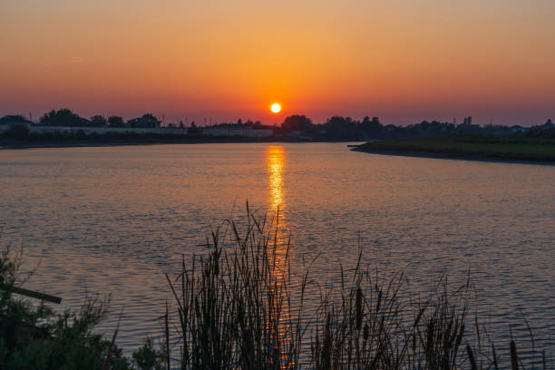 istock Colorful sunset on the river 1280844526