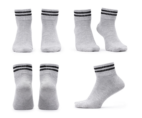 Set of grey socks mockup isolated on white background with clipping path.