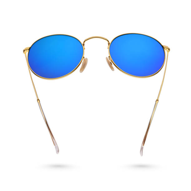 istock Gold frame round blue sunglasses isolated on white. 1280846294