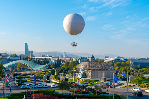 Tbilisi, Georgia - 14 October, 2020: Air excursion balloon for passengers over old city Tbilisi, travel