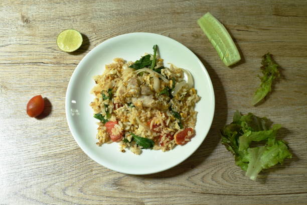 istock fried rice pork and Chinese kale with egg 1280850962