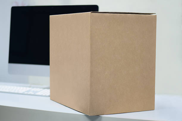 istock Brown transport box on the computer desk 1280851324