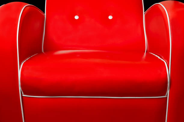istock Red armchair isolated on black background 1280854751