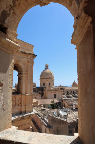 Noto - Glimpse of the cathedral from the bell tower of the Church of Montevergine Noto, Sicily, Italy - August 26, 2020: Panoramic glimpse from the bell tower of the Church of Montevergine noto sicily stock pictures, royalty-free photos & images