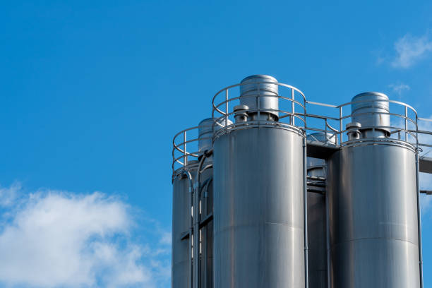 istock Low Angle View Of Factory Against Sky 1280856358