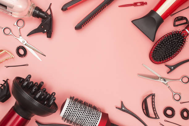 istock professional items for hairdressing, haircuts on a pink background, layout 1280858054
