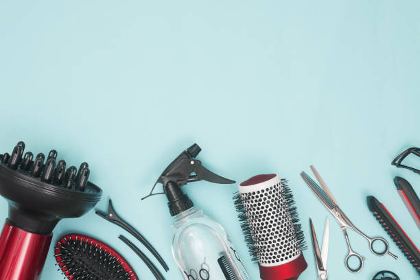 istock professional items for hairdressing, haircuts on a blue background, layout 1280858188