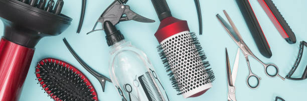 istock professional items for hairdressing, haircuts on a blue background, layout 1280858190