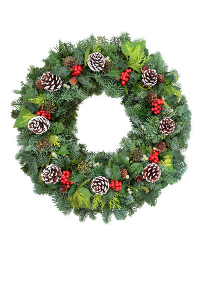 istock Holly and Winter Greenery Solstice Wreath 1280861861