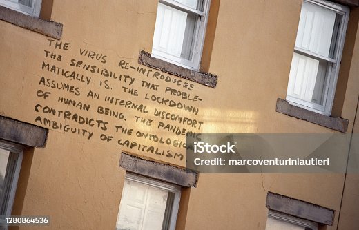 istock meaningless and complex speech about virus and pandemic written on a residential wall 1280864536