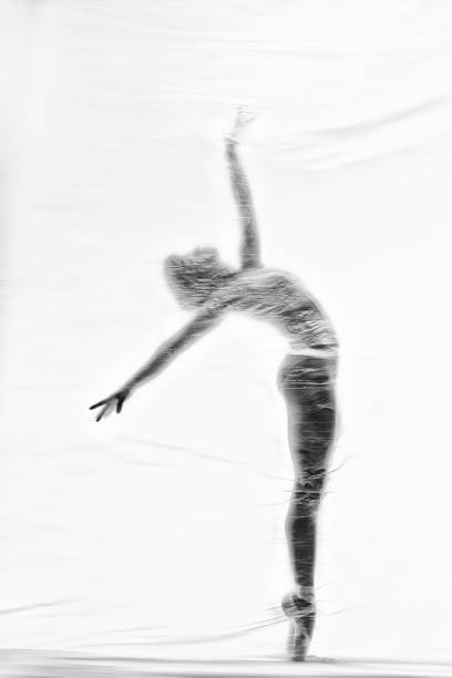 anmutige ballerina tanzen mit transparentem nylon - nylon legs stock-fotos und bilder