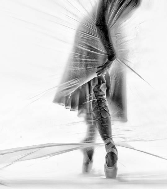 istock Graceful ballerina dancing with transparent nylon 1280865156