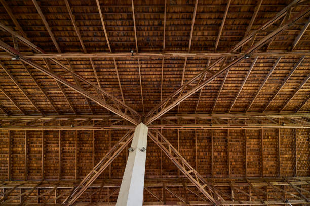 istock ancient wood and Thatched roof and cement pillar for background 1280865178
