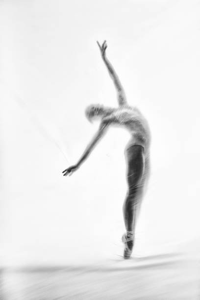 istock Graceful ballerina dancing with transparent nylon 1280866772