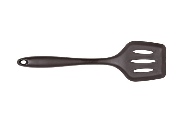 istock Brown chef's spatula isolated on a white background. 1280866857