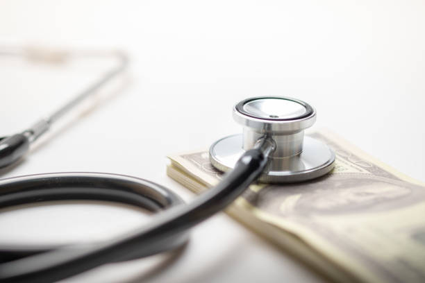 istock Stethoscope with dollar on white background, health insurance concept 1280867681