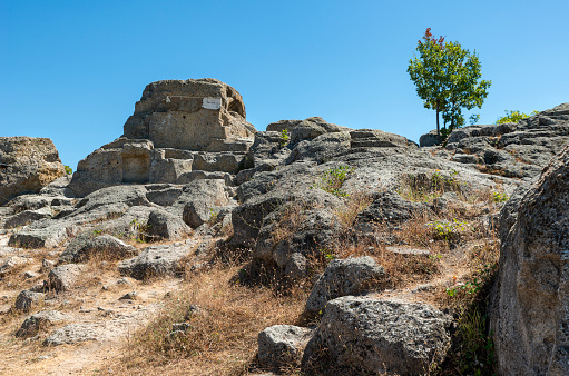 Thracian sanctuary, located near Tatul village, Kardjali region, Bulgaria. Carved grave cut in the rock, II millennium BC.