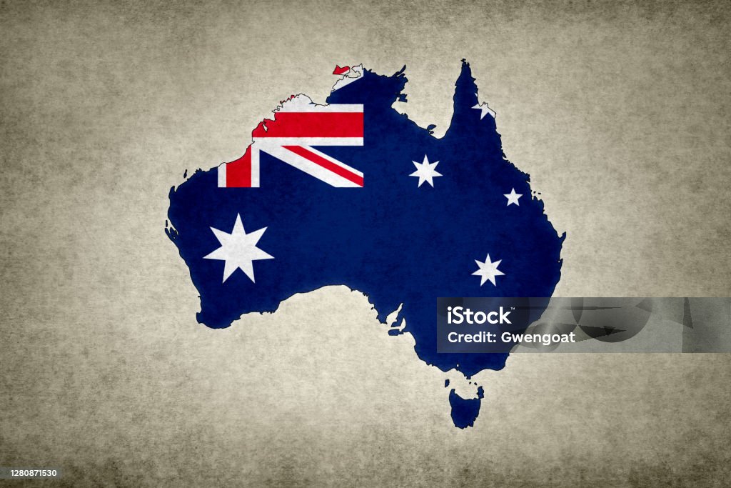 Grunge map of Australia with its flag printed within Grunge map of Australia with its flag printed within its border on an old paper. Abstract Stock Photo