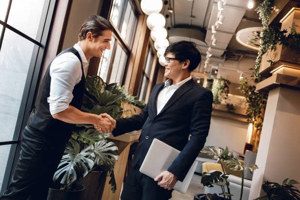 istock Happy Diversity Business People making Handshake Greeting. Partnership or Teamwork Concept 1280871705