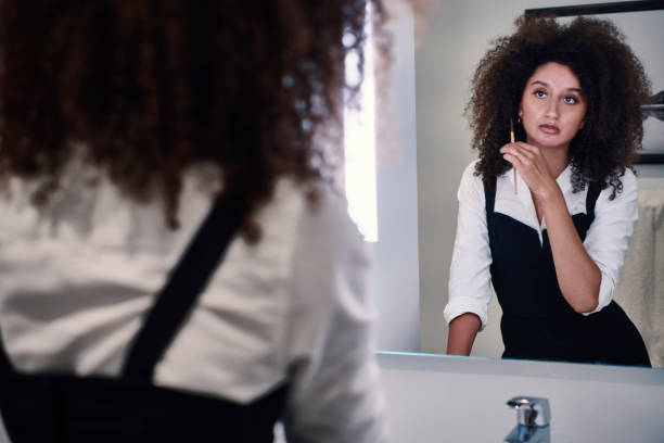 istock Woman in bathroom 1280872642