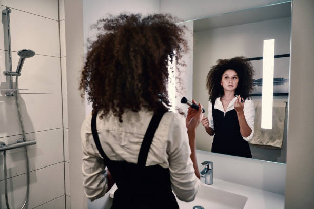istock Woman in bathroom 1280872699