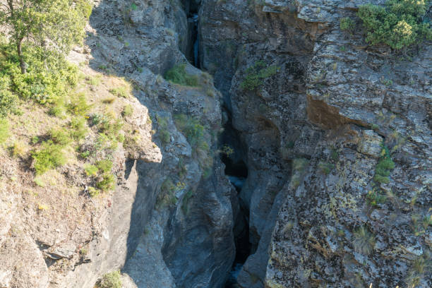 istock Water flowing down a ravine in Sierra Nevada in southern Spain 1280875083