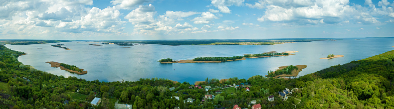 Aerial view from a drone to the Dnieper, beautiful landscapes, green islands on the river. View from the top to the Dnieper river