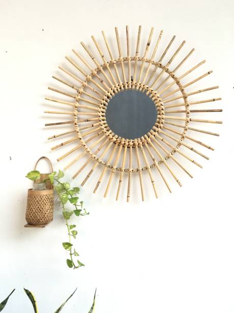 istock Beautifful rounded flower shape Rattan mirror 1280886035