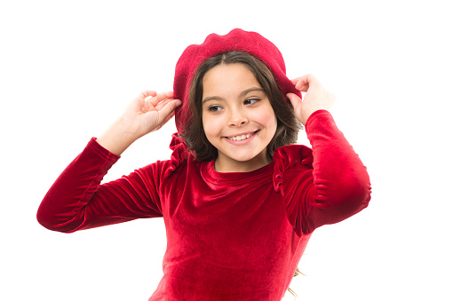 cute stylish girl in red beret. dream about france. cheerful kid wearing french style beret. happy childrens day. kid fashion and beauty. small girl looking stylish. childhood happiness.