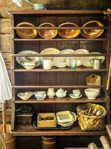 istock Old timey shelf of kitchen wares 1280890180