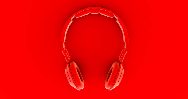 istock red headphone  on red background. music. 3d render 1280891118
