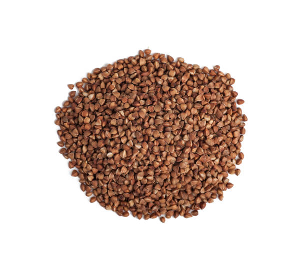 istock buckwheat in a pile scattered top view isolated on a white background 1280892492