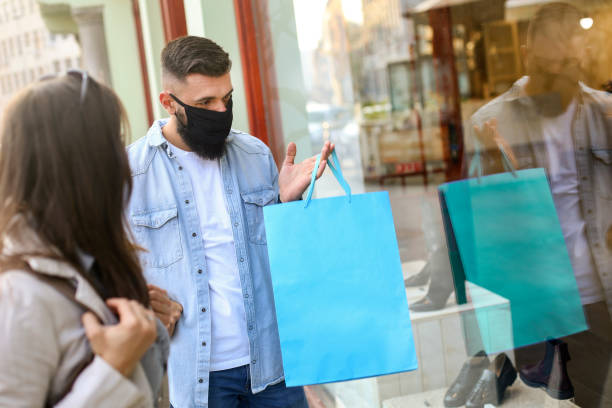 istock Young couple window shopping during the pandemic 1280893652