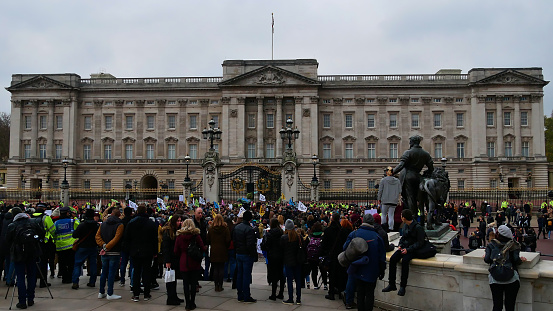 London, UK - 11/24/2018: Activists of global environmental movement Extinction Rebellion (XR) protesting in front of Buckingham Palace.