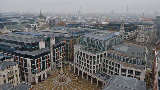 Aerial view of Paternoster Square and surrounding area on a misty day in autumn. London, UK - 11/23/2018: Aerial view of Paternoster Square and surrounding area on a misty day in autumn. paternoster square stock pictures, royalty-free photos & images