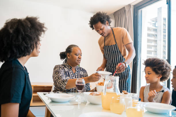 istock Family having lunch together at home. 1280894926