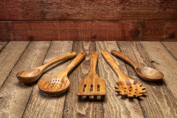 istock wooden kitchen cooking utensils set 1280899481