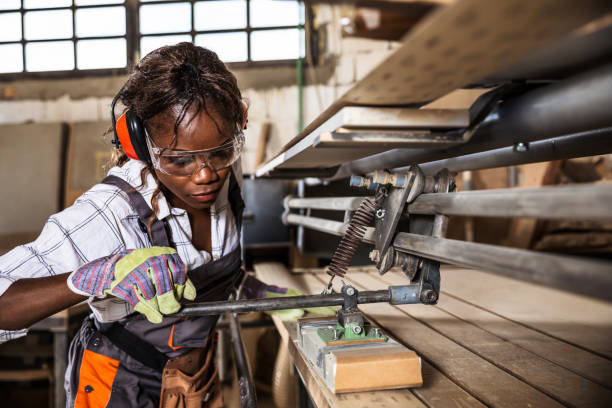 istock Manual worker working with wood in carpentry. 1280901789