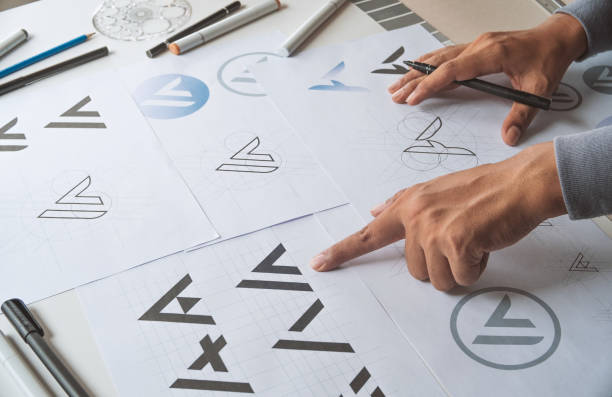 istock Graphic designer creative design sketch drawing logo Trademark brand Workspace 1280904368
