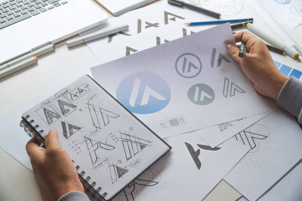 istock Graphic designer creative design sketch drawing logo Trademark brand Workspace 1280904369