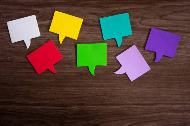 istock A colourful blank speech bubble on wooden table 1280905279