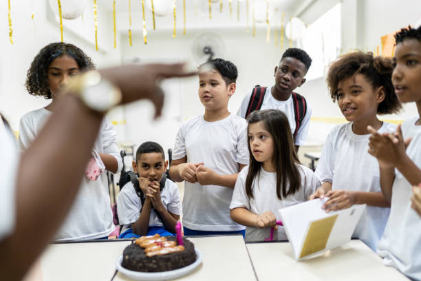 Elementary school class celebrating a birthday
