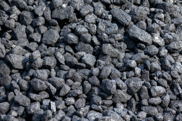 istock Black Coal pile as background in stock for steam train 1280910902